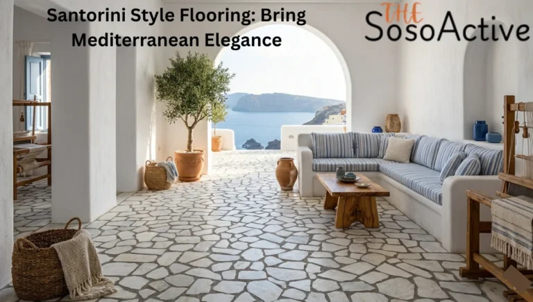 Sun-drenched patio with blue striped sofa, olive trees, and sea view, highlighting the stone Santorini Style Flooring